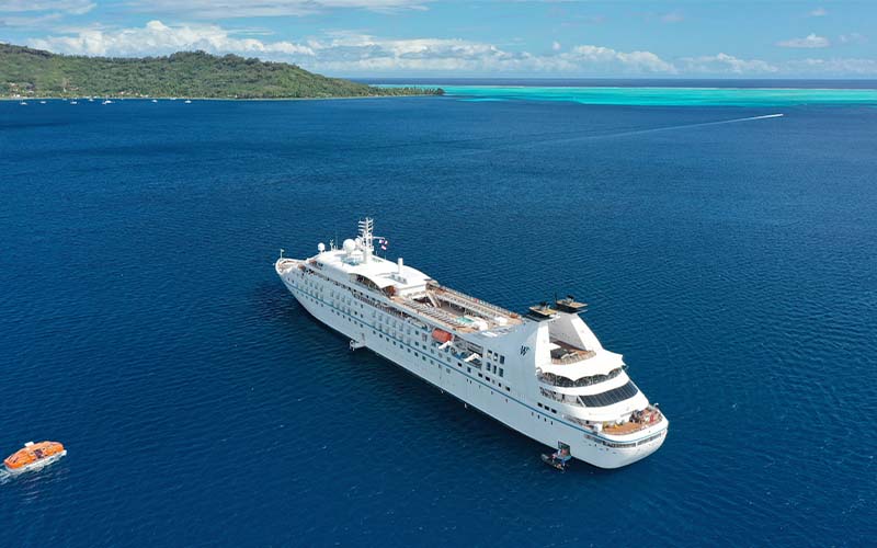 Up to $200 shipboard credit per cabin or Up to $100 for solo travelers with Windstar Cruises